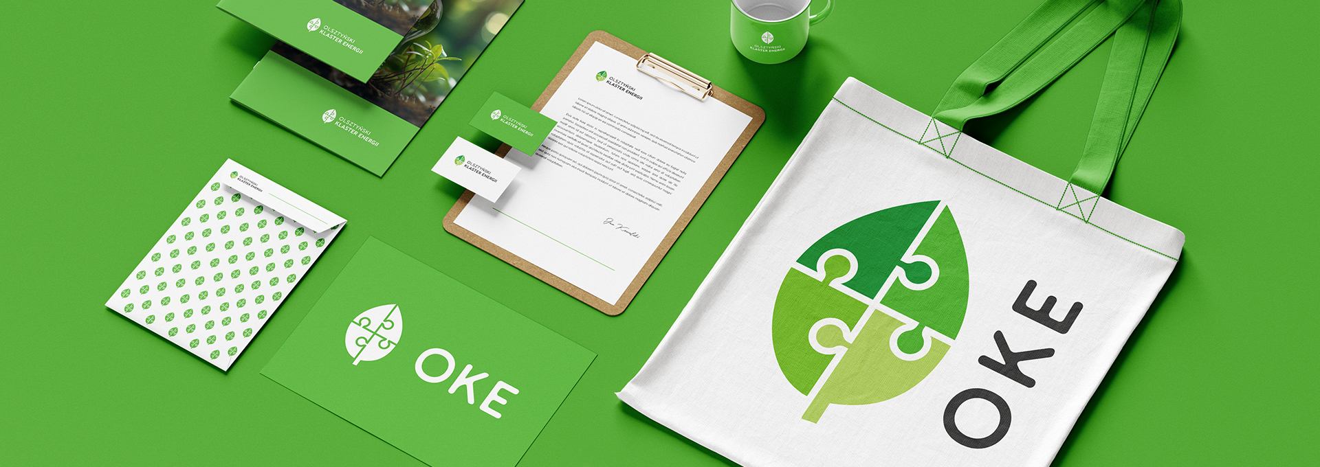 logo Olsztyński Klaster Energii – ekologiczne logo tło